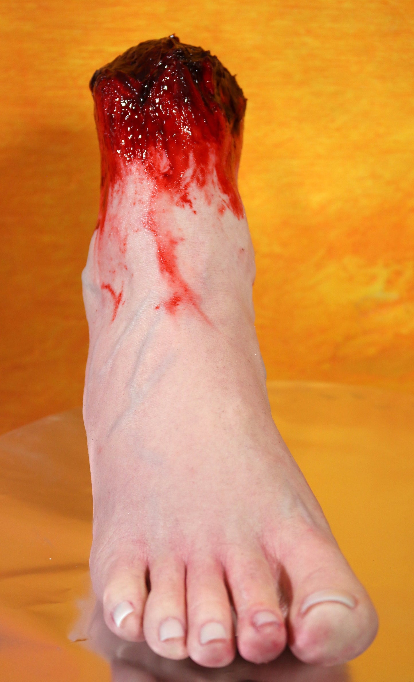 Bloody severed foot, very realistic. Great for Halloween decoration, haunted house or horror prop