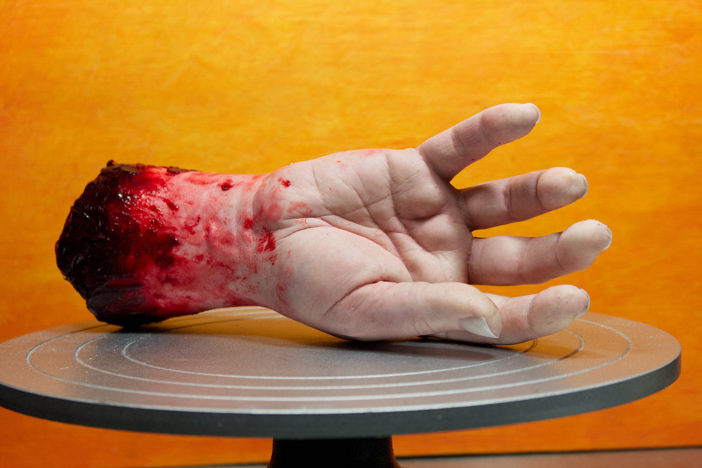 Bloody severed silicone hand, realistic. Great for Halloween decoration, haunted house or horror prop