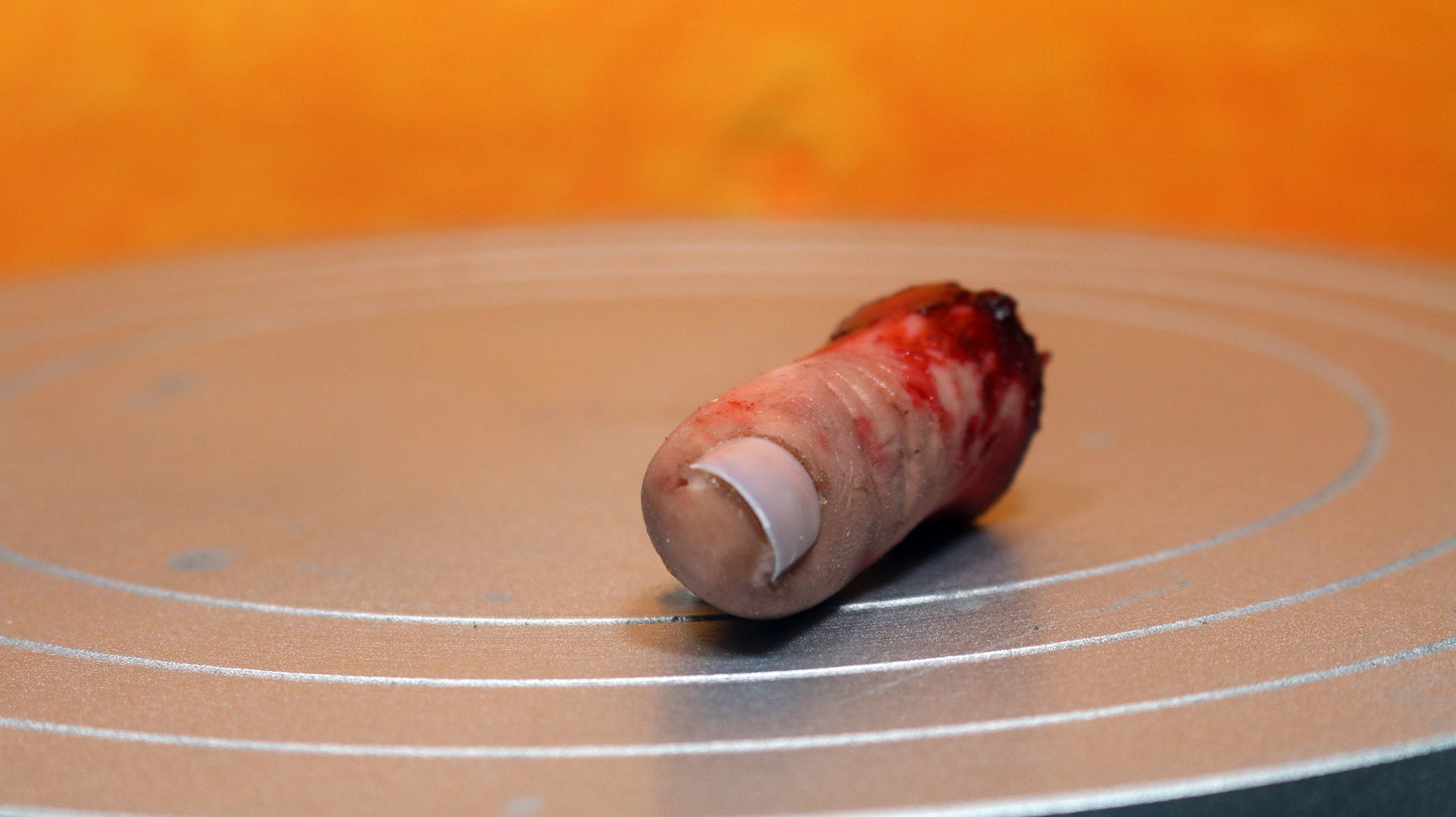 Bloody severed thumb. Perfect halloween decoration or horror prop