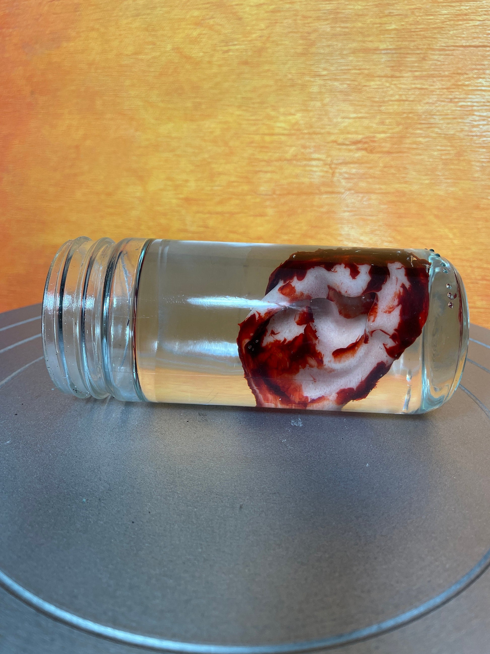 Wet Specimen Severed Ear in Jar. Lights up! No liquids. Great for Halloween, Haunted House, Horror Scenes, Horror props