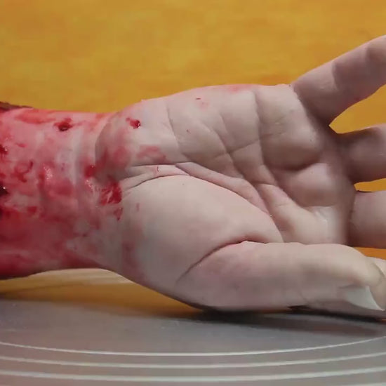 Bloody severed silicone hand, realistic.  Great for Halloween decoration, haunted house or horror prop