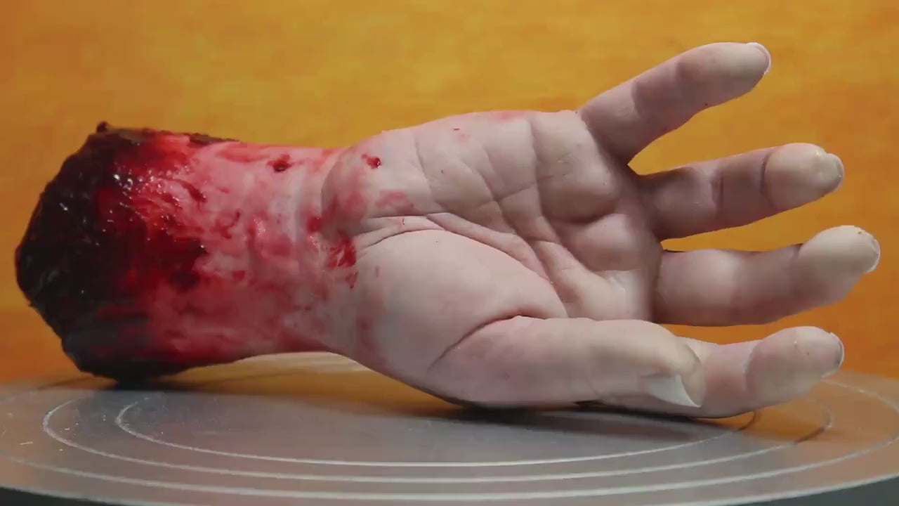 Bloody severed silicone hand, realistic.  Great for Halloween decoration, haunted house or horror prop